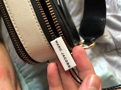 how to spot a fake marc jacobs tote bag|marc jacobs knock off bags.